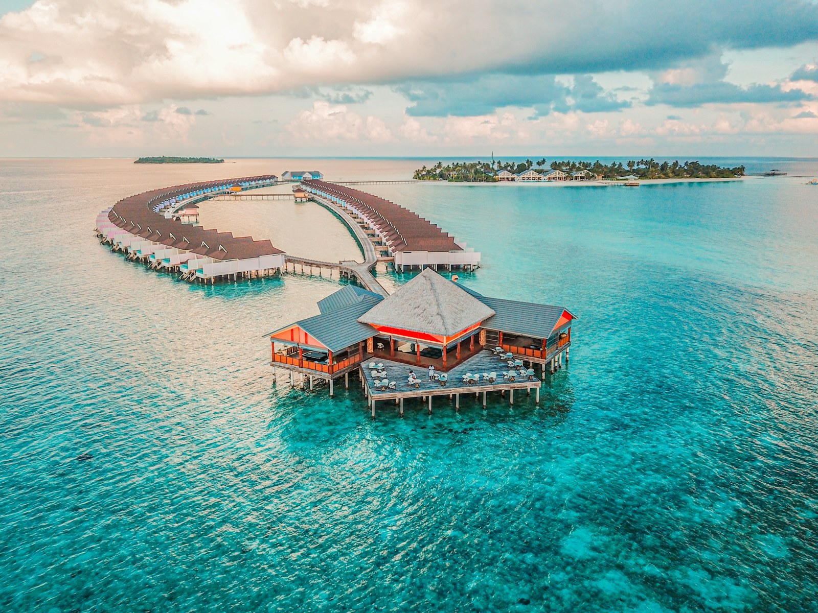 Overwater bungalow over clear lagoon